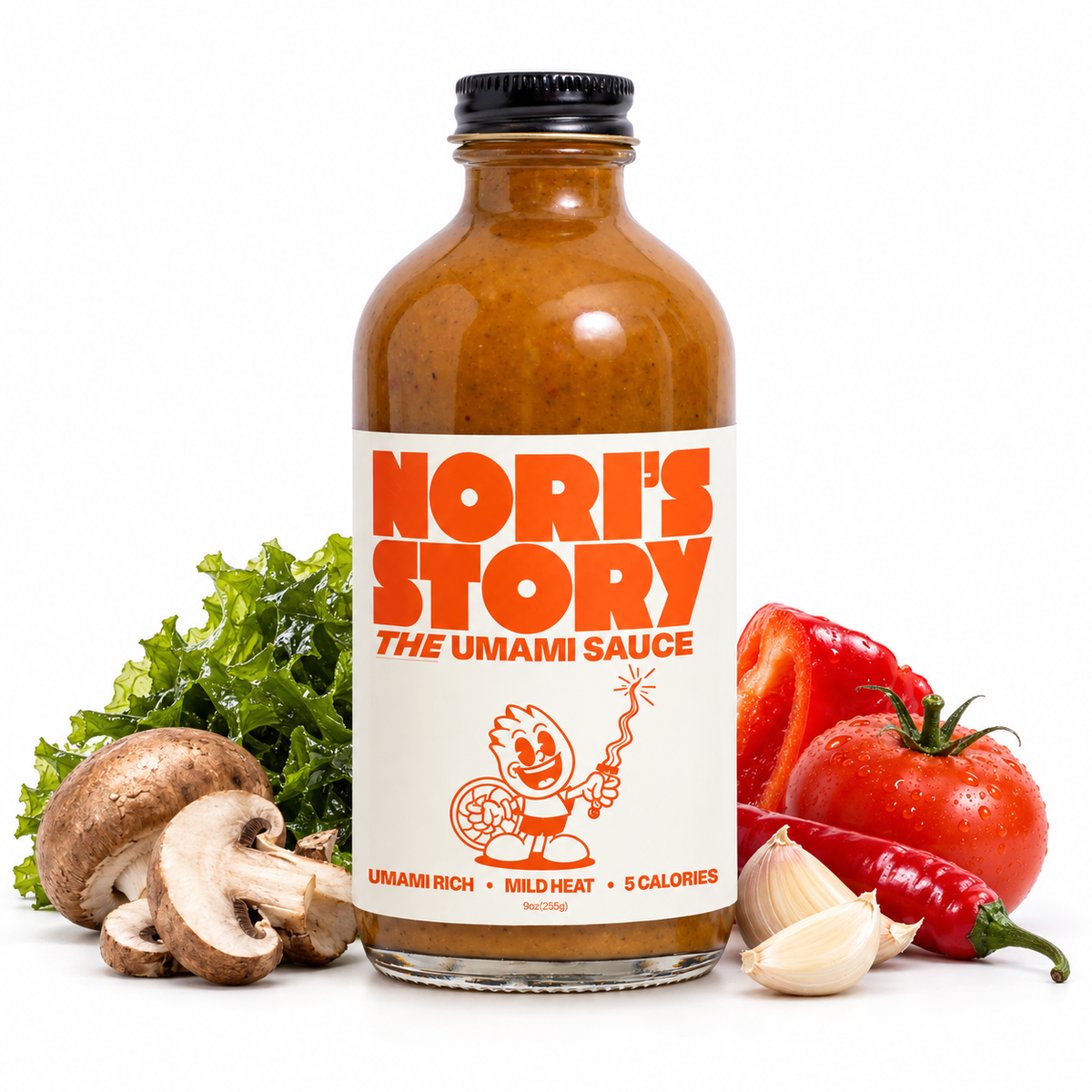 A bottle of Nori's Story The Umami Sauce centered on a white background, surrounded by fresh ingredients including a mushroom, lettuce, red bell pepper, tomato, red chili pepper, and garlic cloves.